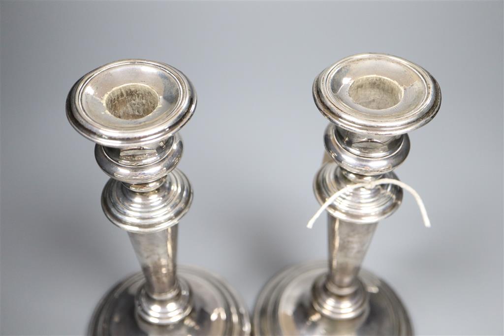 A pair of William IV silver pillar candlesticks, Sheffield 1832, Henry Wilkinson & Co, 23.4cm, weighted.